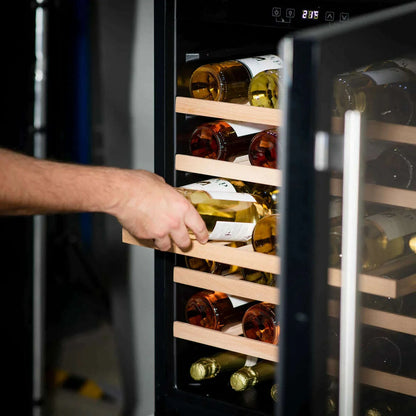 Sleek Baridi wine cooler with glass door, digital controls, fits 54 bottles, modern kitchen style.