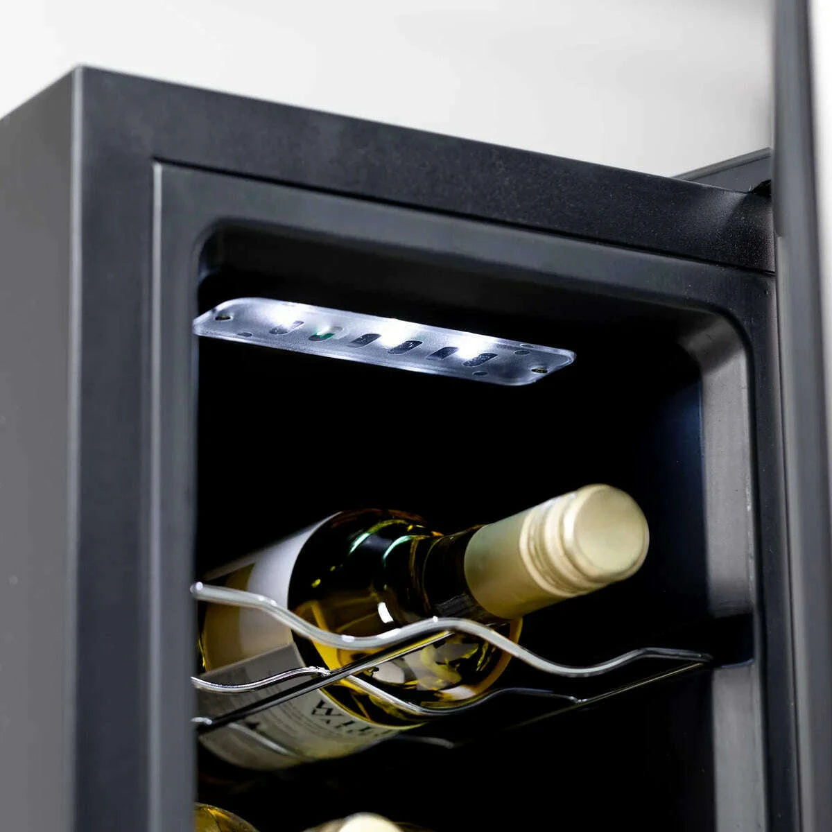 Sleek Baridi wine cooler with digital controls, LED light, and mirror glass door, holds 12 bottles.