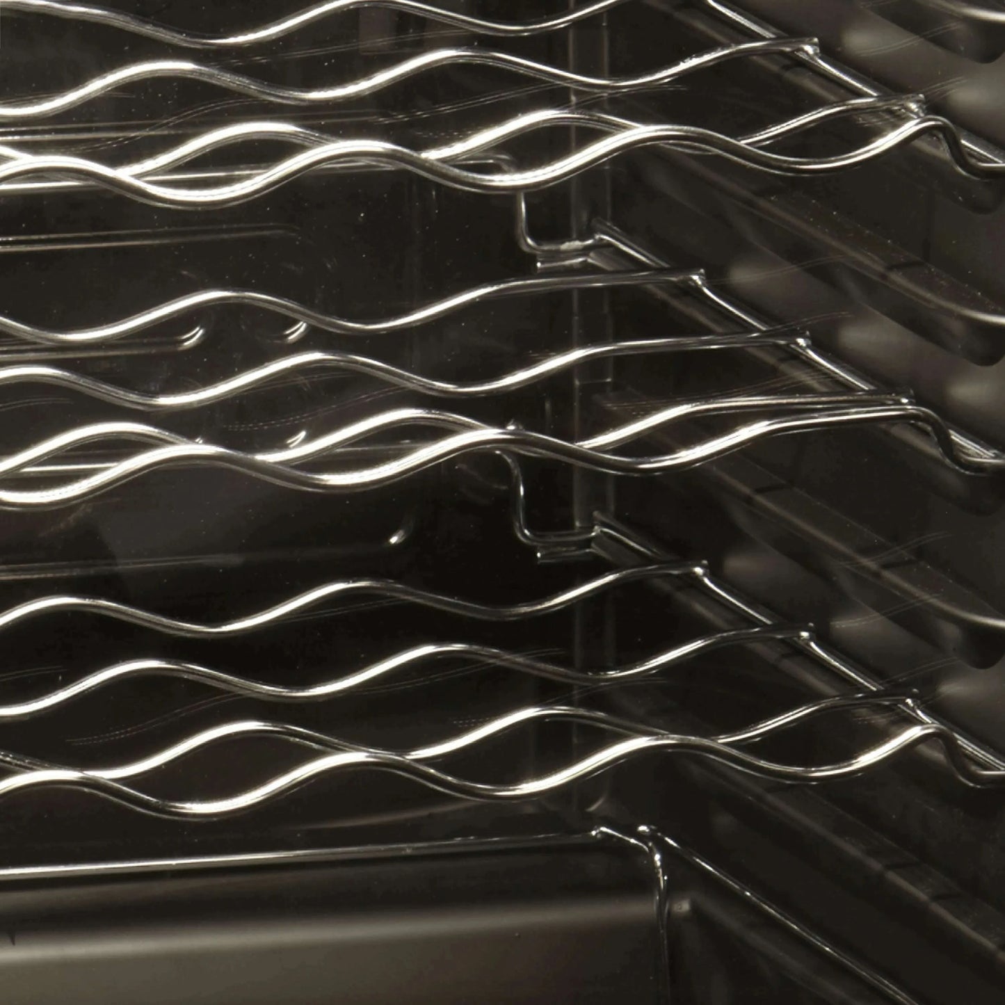A sleek Tefcold wine cooler with glass door, LED lighting, and space for 22 bottles.