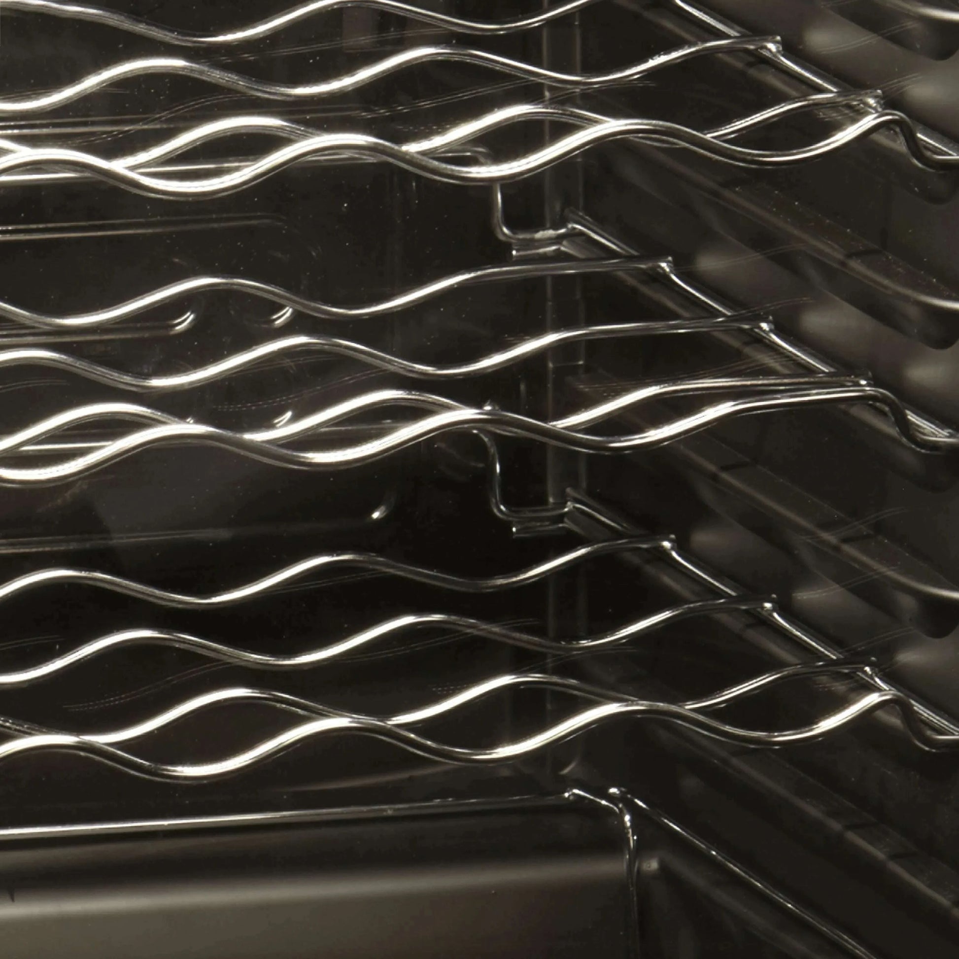 A sleek Tefcold wine cooler with glass door, LED lighting, and space for 22 bottles.