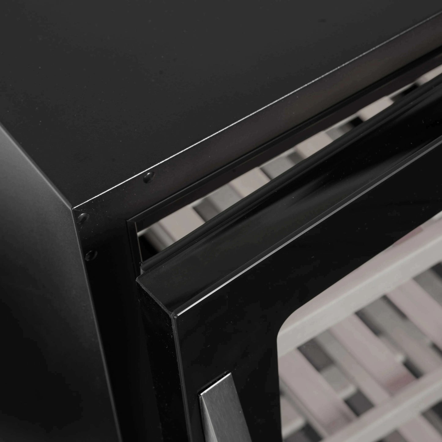 Tefcold dual-zone wine cooler with glass door and wooden shelves, holding up to 119 bottles.