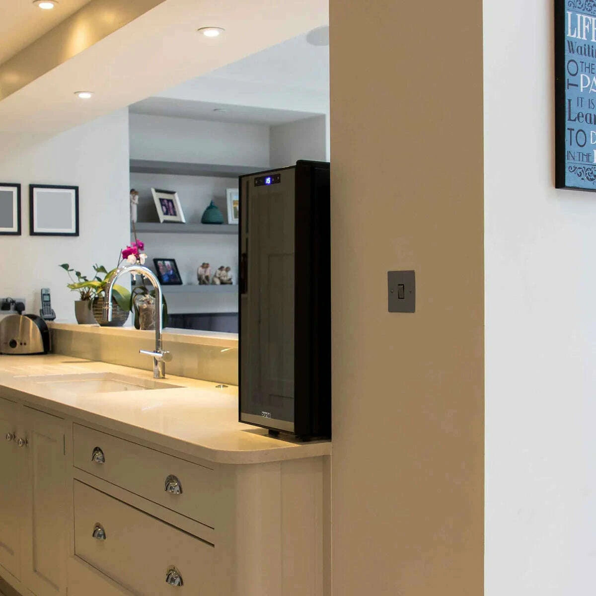 Sleek black 12-bottle wine fridge with touch controls and mirrored glass door.