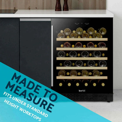 Sleek 54-bottle wine cooler with digital controls and mirrored glass door under kitchen counter.