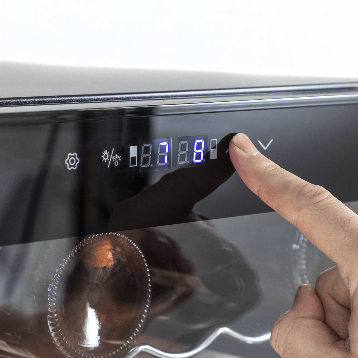 Dual zone wine cooler with mirror glass door, 52-bottle capacity, sleek modern design.
