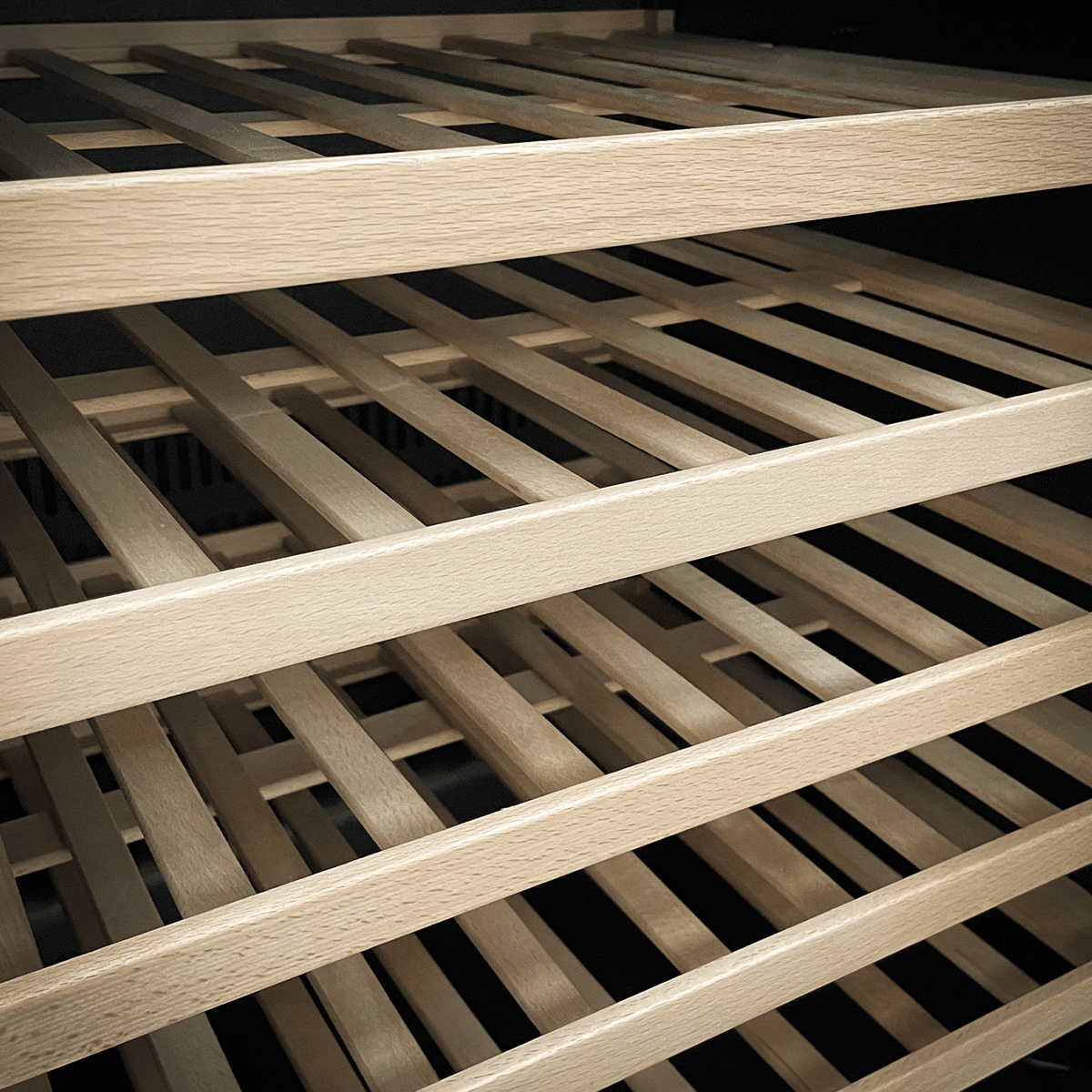 Sleek black wine fridge with dual zones, glass door, and wooden shelves, holding 46 bottles.