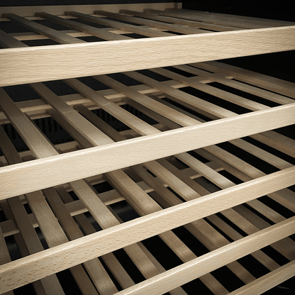 Sleek black wine fridge with dual zones, glass door, and wooden shelves, holding 46 bottles.