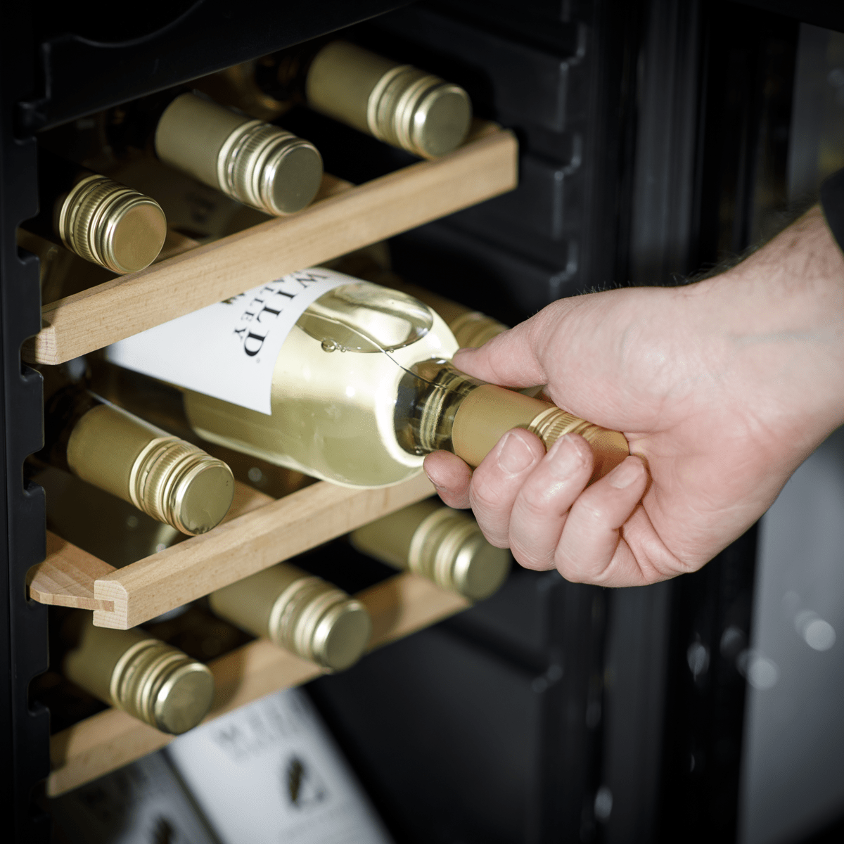 Baridi 18 Bottle Wine Cooler with dual zones, touch controls, and wooden shelves, sleek glass door.