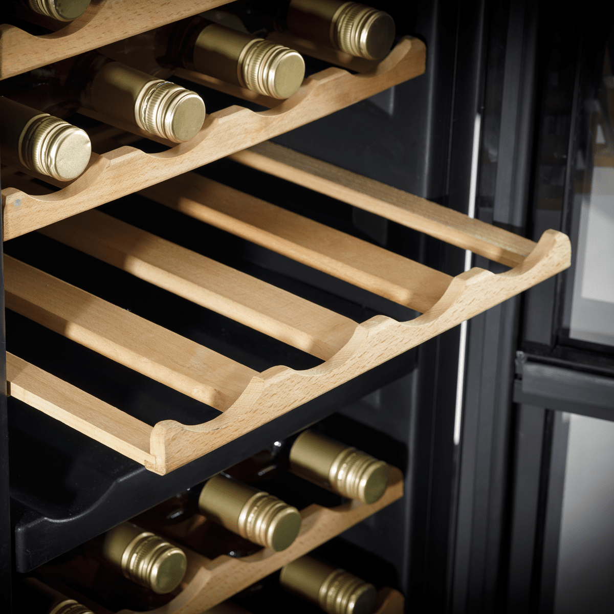 Dual zone wine cooler with wooden shelves, LED lighting, and a sleek mirror glass door.